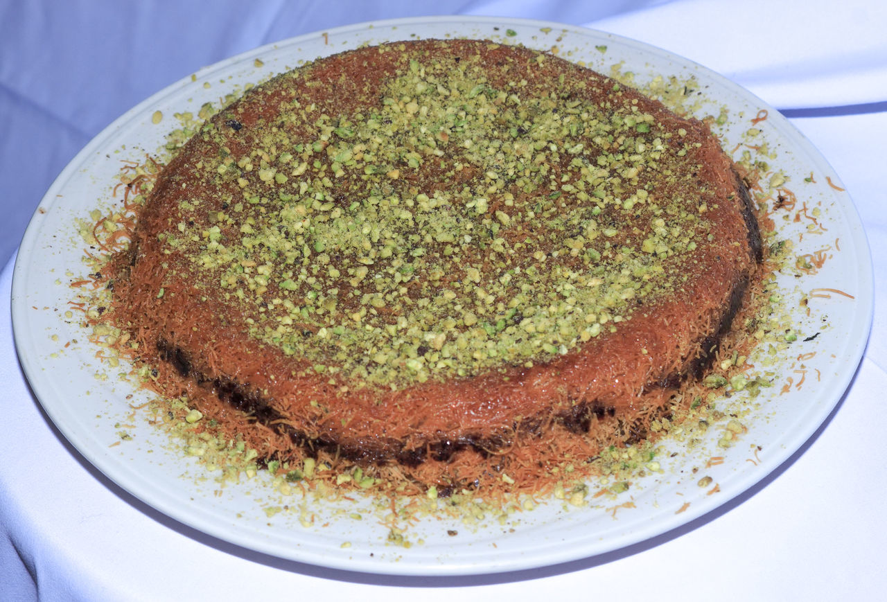 HIGH ANGLE VIEW OF CAKE IN PLATE ON TABLE