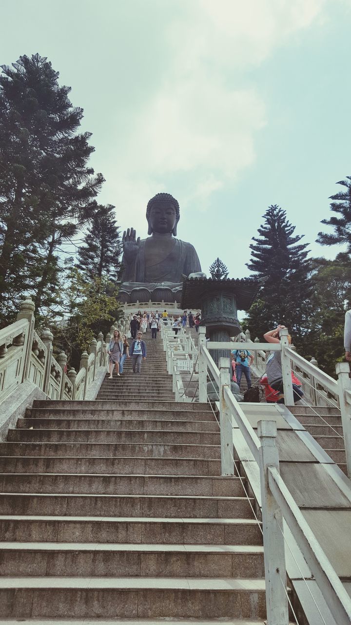 steps, staircase, railing, steps and staircases, sky, tree, travel destinations, tourism, day, built structure, large group of people, outdoors, stairs, cloud - sky, architecture, people