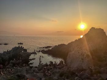 Scenic view of sea against sky during sunset