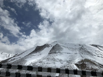 Snow covered mountain against sky