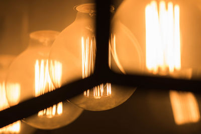 Close-up of illuminated light bulb