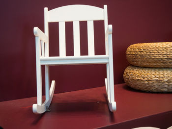 Close-up of empty chair on table at home