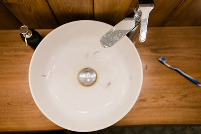 High angle view of sink on table