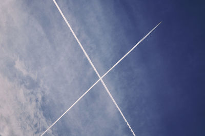 Low angle view of vapor trail in sky