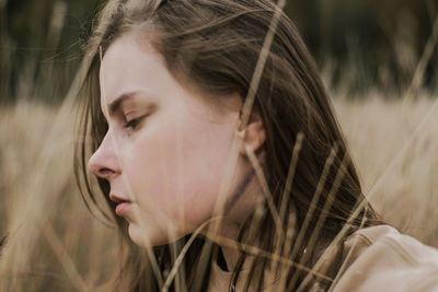 Portrait of a young woman on a sunny day in autumn