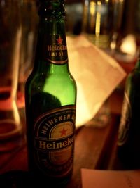 Close-up of beer bottle on table