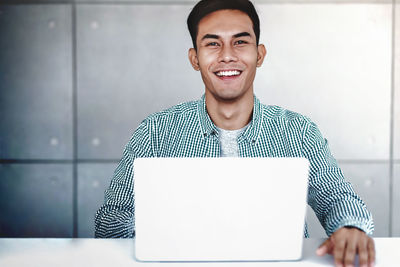 Portrait of a smiling young man