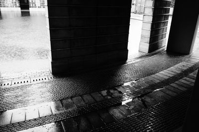 Building reflecting in water