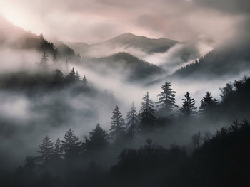 Scenic view of mountains against sky during sunset