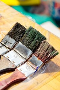 High angle view of paintbrushes on table