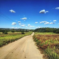 Road passing through field