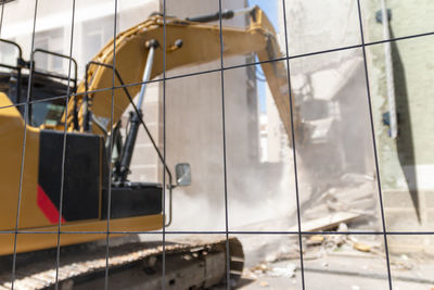 Demolition of old building dismantling. destruction of dilapidated housing for new development