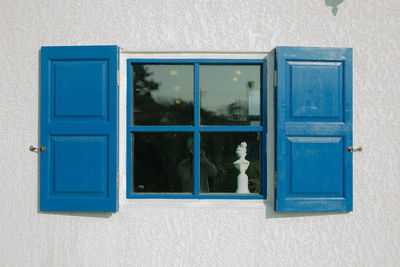 Blue sky seen through window