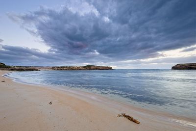 Scenic view of beach against sky
