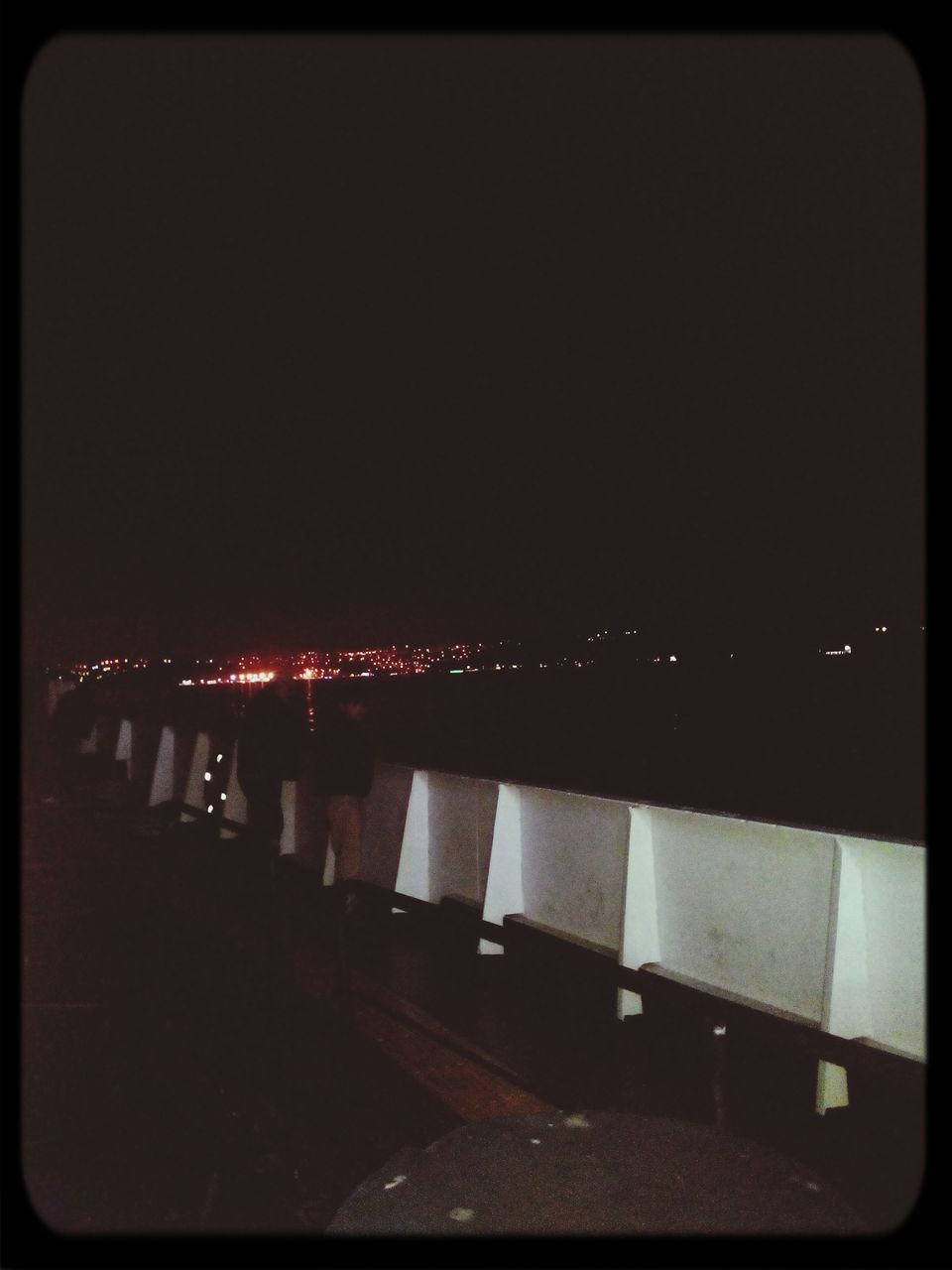 illuminated, night, architecture, transfer print, built structure, clear sky, auto post production filter, copy space, bridge - man made structure, city, connection, building exterior, water, lighting equipment, sky, high angle view, bridge, river, reflection, street light