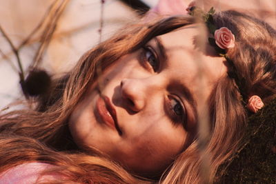 Close-up portrait of beautiful woman wearing tiara outdoors