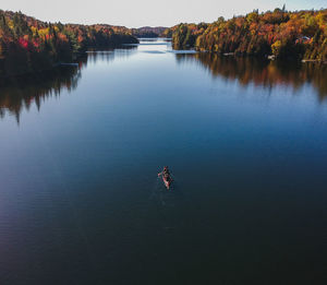 High angle view of lake by trees