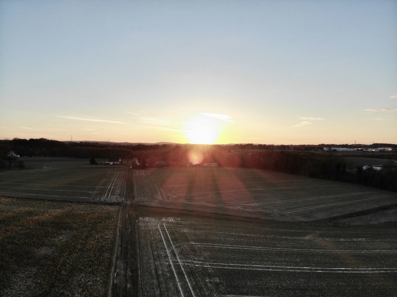 SCENIC VIEW OF LANDSCAPE AGAINST SKY DURING SUNSET