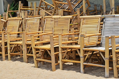 Wooden chairs at beach