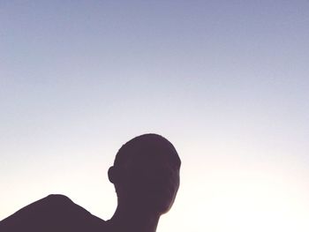 Portrait of silhouette man against clear sky