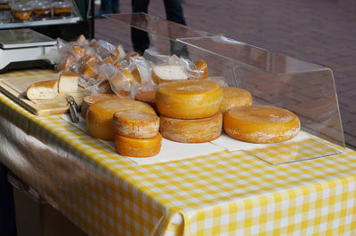 Cheese wheels for sale at market