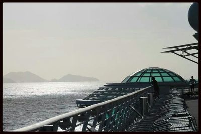 Pier on sea against sky