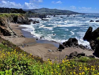 Scenic view from iconic pacific coast highway 1 in northern california of cliffs and sea against sky