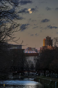 View of city against cloudy sky