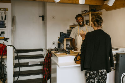 People standing on chair