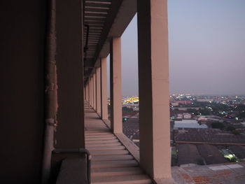 View of bridge and buildings against sky