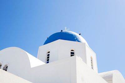 Low angle view of church against clear blue sky