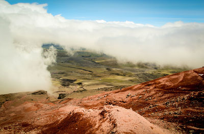 Smoke emitting from volcanic landscape