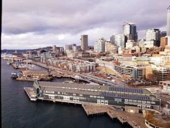 High angle view of river amidst buildings in city