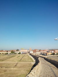 View of built structure against clear blue sky