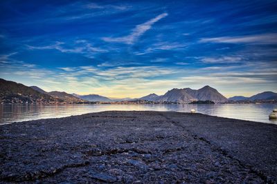 Scenic view of beach against sky during sunset