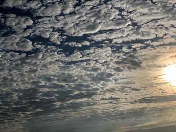 Low angle view of clouds in sky during sunset