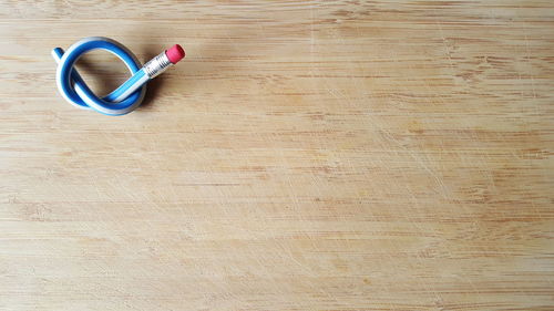 Close-up of wooden object on table