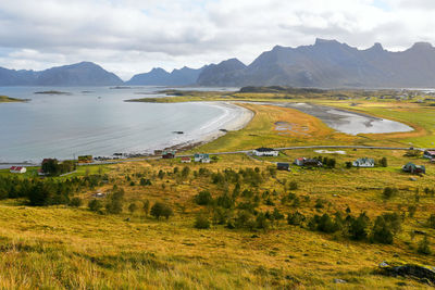 Panoramic view from mountain top over beach and countryside at coast in moskenesoya lofoten norway