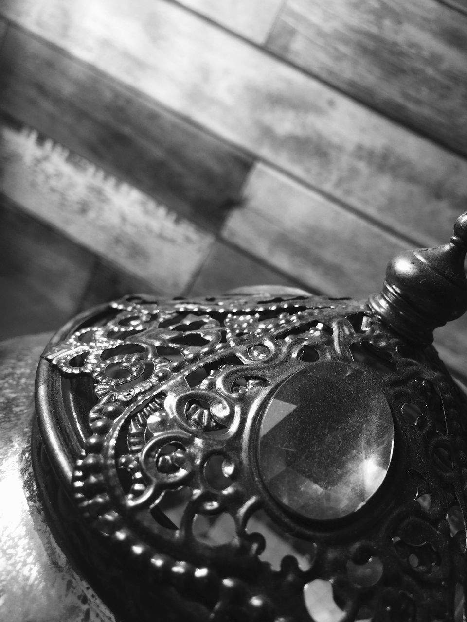 HIGH ANGLE VIEW OF ORNATE ON TABLE