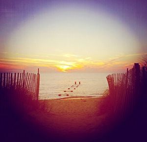 Scenic view of sea at sunset