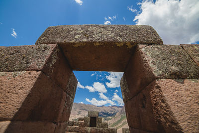 Low angle view of old ruins against sky