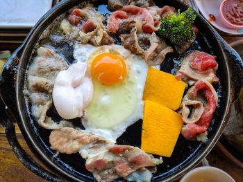 High angle view of breakfast served on table