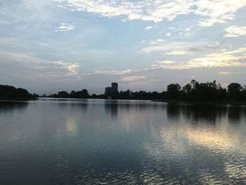 Scenic view of lake against sky during sunset