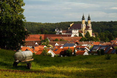 High angle view of town and church against sky