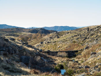 Scenic view of mountains against clear sky