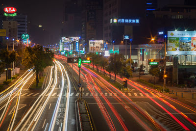 Blurred motion of car on road at night