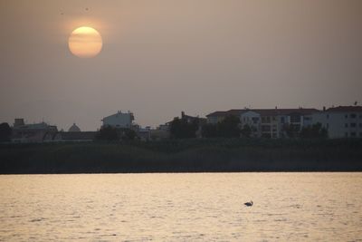 View of buildings against sky during sunset