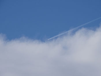 Low angle view of vapor trail in sky