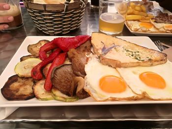 Close-up of breakfast served on table