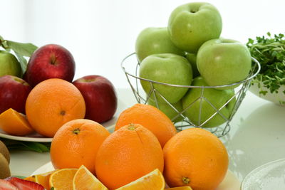 Close-up of fruits in bowl on table